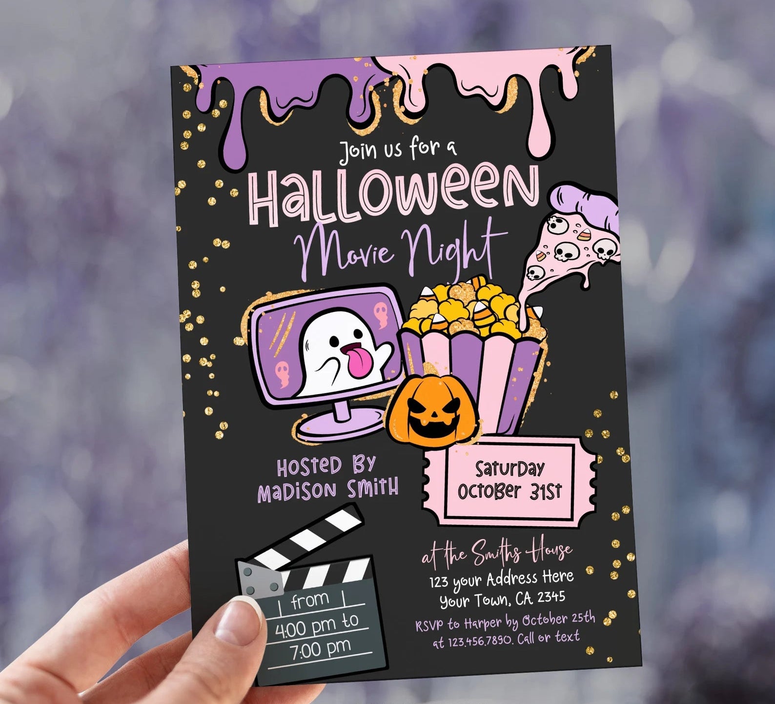 Halloween movie night invitation held by a hand with a purple and black background.